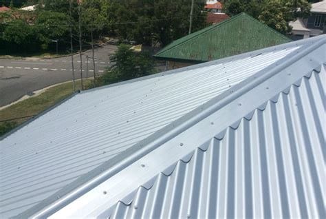 sheet metal roofing - custom orb profile - scribed hip capping