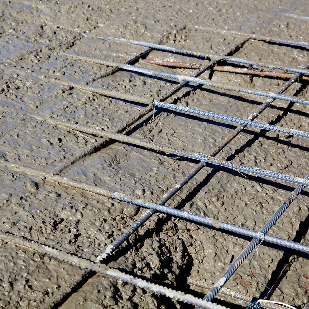 wet concrete and steel reinforcement
